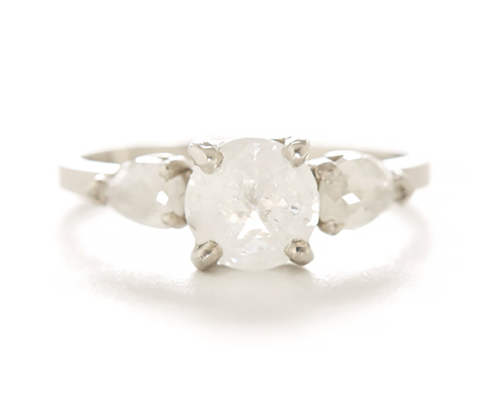 Facet Three Stone Opaque Diamond Ring