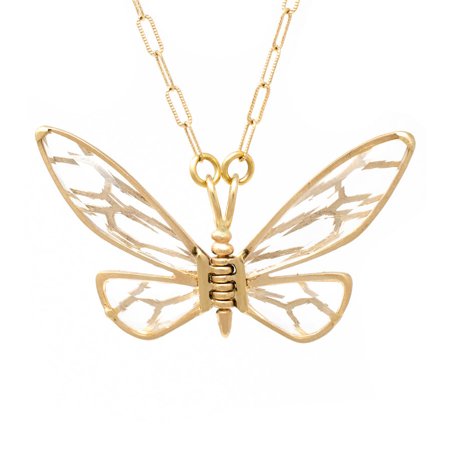 A gold-colored lace winged butterfly necklace with a textured chain.